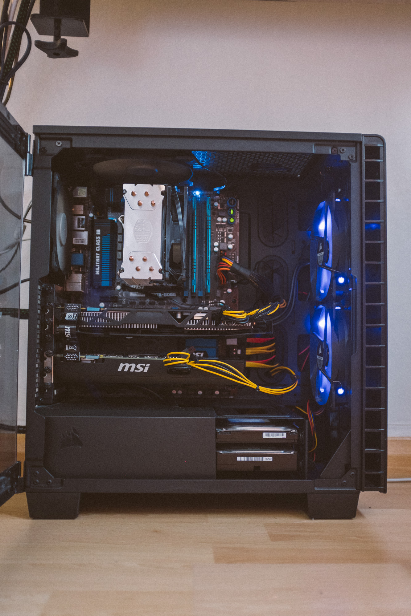 gaming PC with open side door revealing it's parts