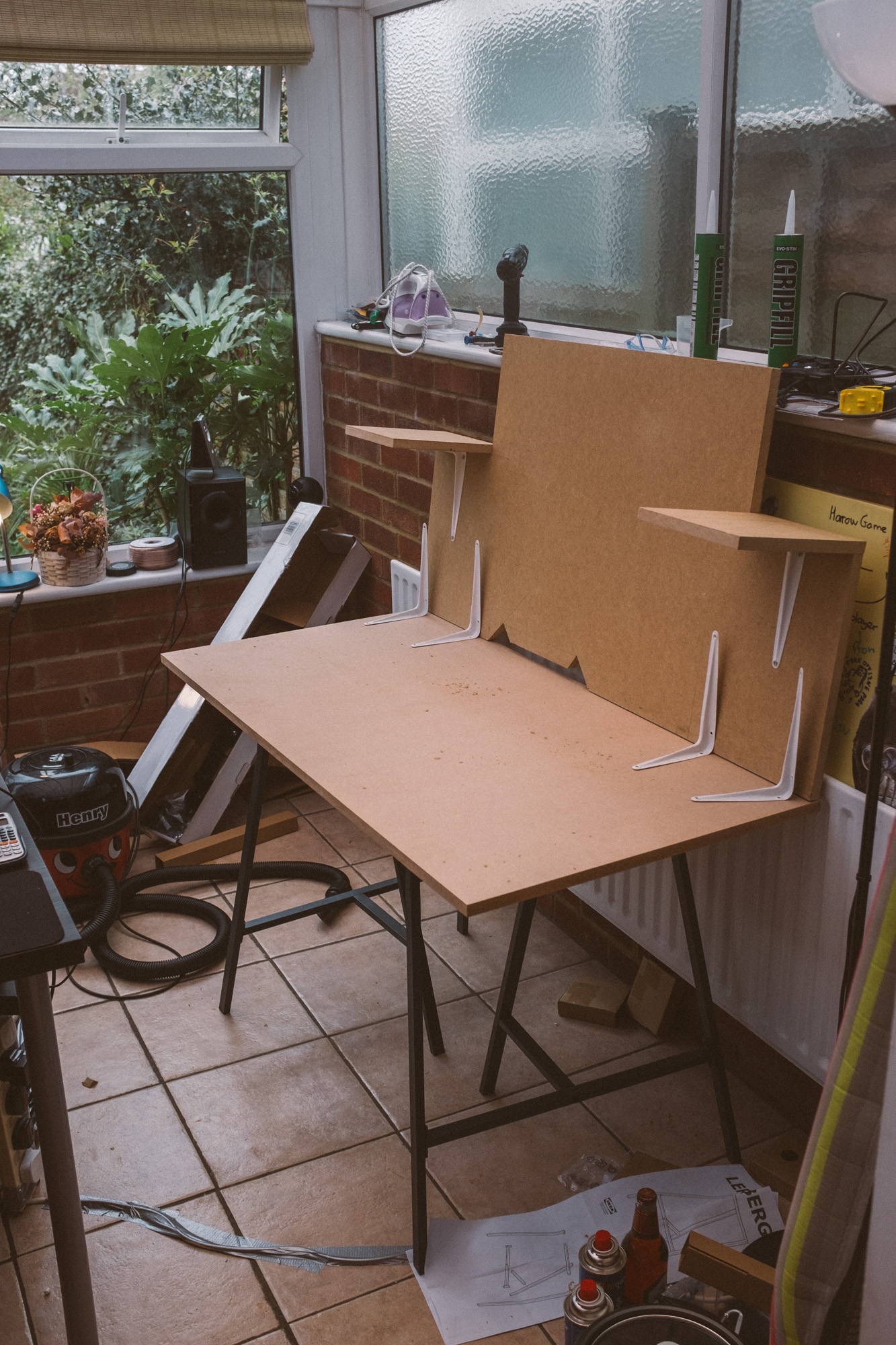 back plate with speaker stands sat on top of base plate, all MDF, a cut out slot at the bottom of the back plate about 50cm wide