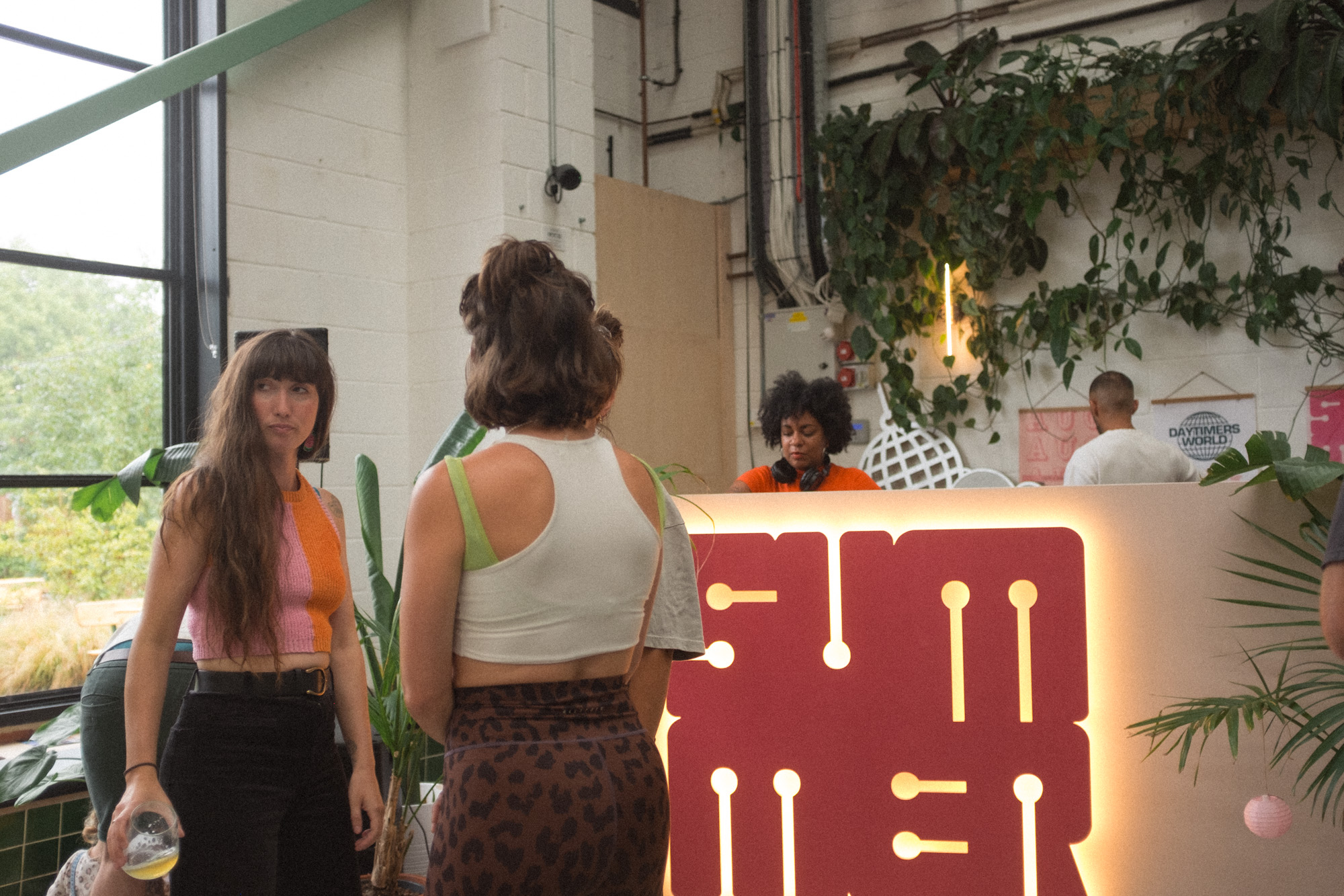 DJ with people dancing closer up