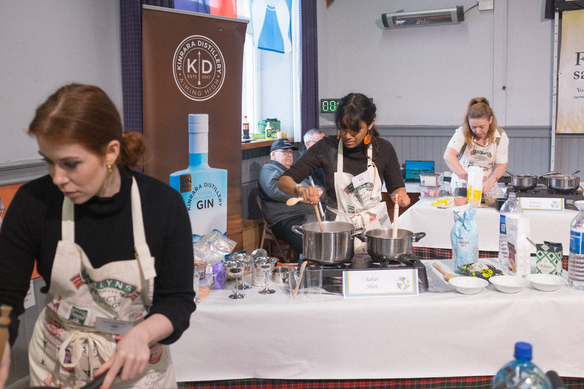 Sahar cooking with two pots at once